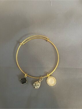 Gold Charm Bangle Bracelet with Black, Speckled and Pearl Charms